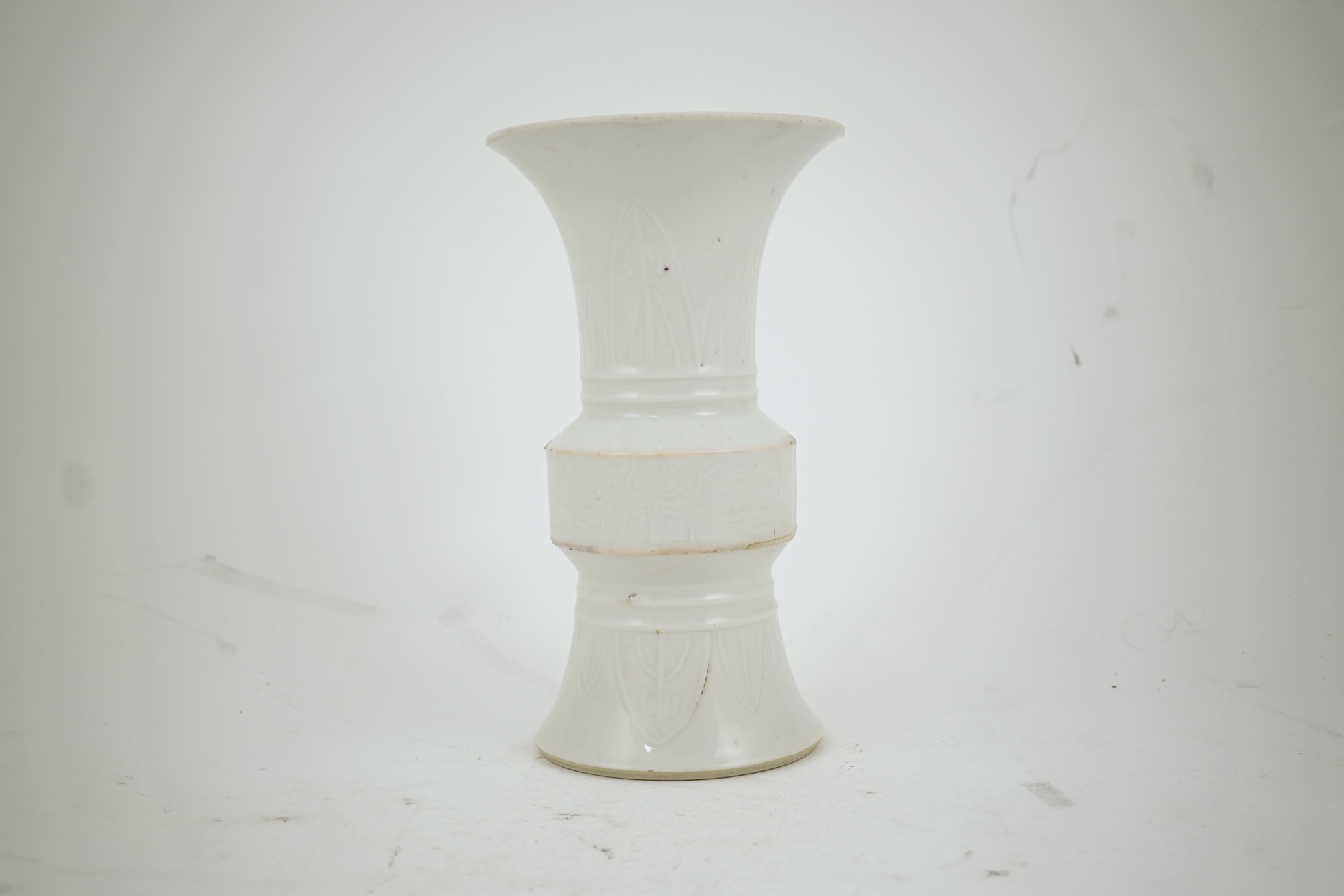 A Chinese white glazed 'gu' vase, 19th century
